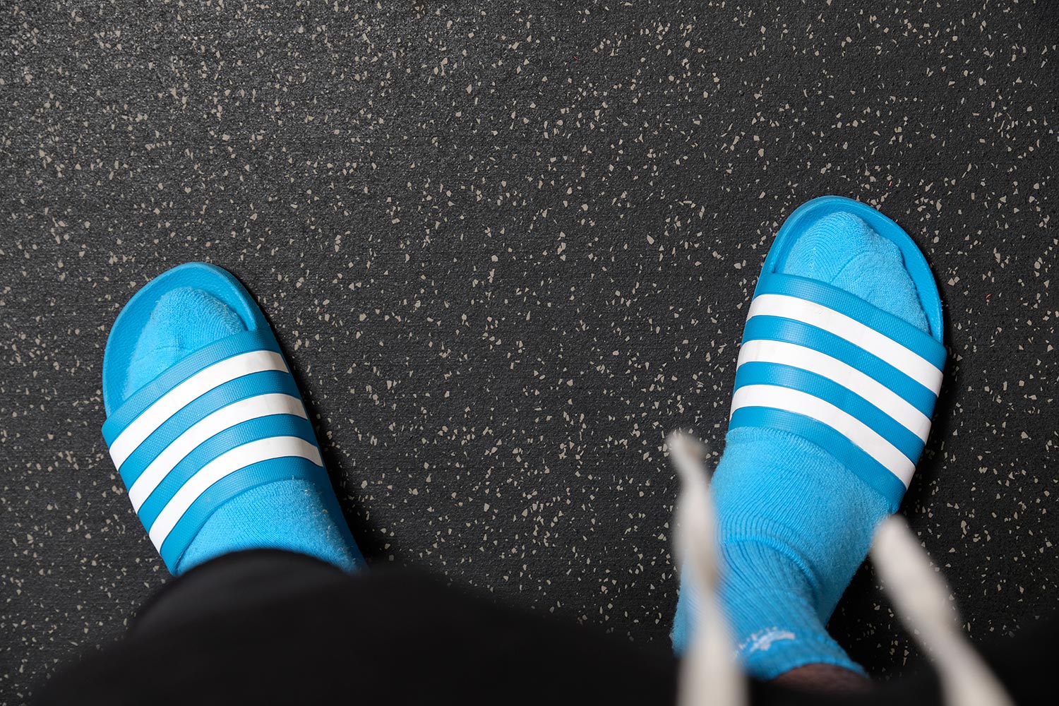 blue slides and socks