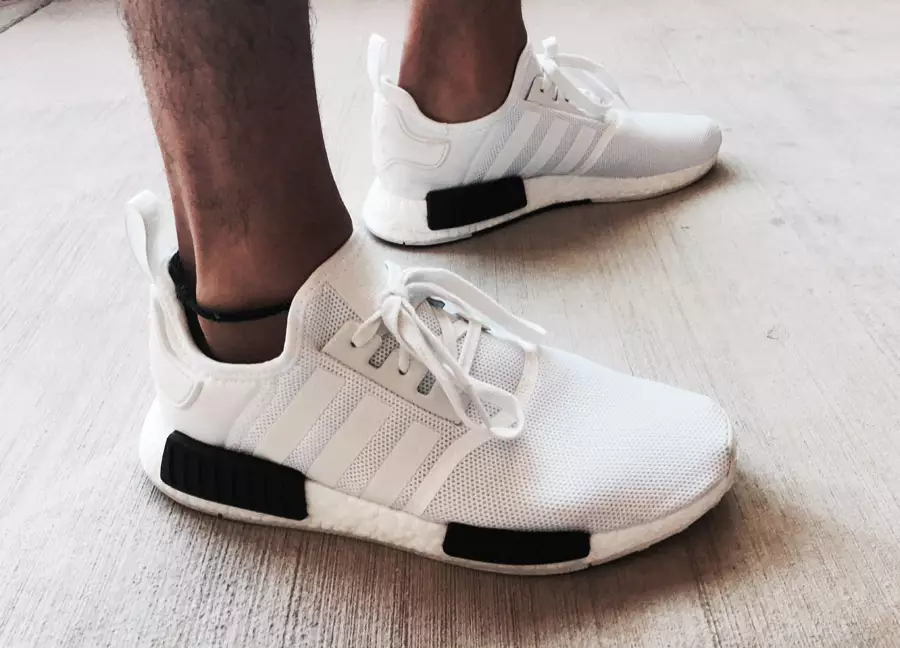 Adidas NMD blanches à bandes noires